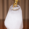 Faceted Glass Décor Piece with Golden Figure